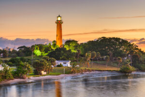 Jupiter, Florida, Inlet Lighthouse at sunset in Jupiter, Florida – coastal view ideal for digital marketing, advertising visuals, and local website development content."